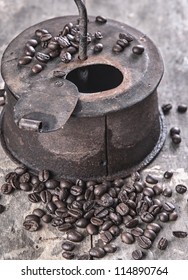 Old Coffee Roaster On Wooden Table