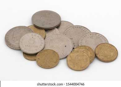 Old Coins stack isolated white background for saving money commercial