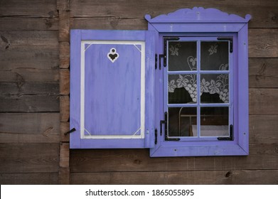 old colored window with shutter