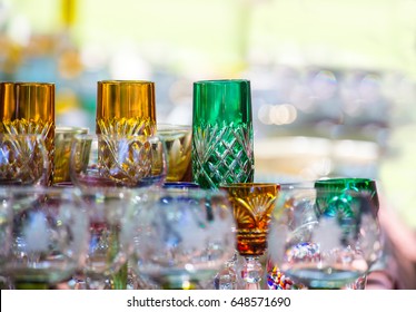 Old, Colorful Glasses Are On Sale On An Antique Market