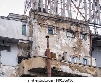 Old Communist Building With Bullet Marks Or Holes From The Romanian Revolution In  December 1989