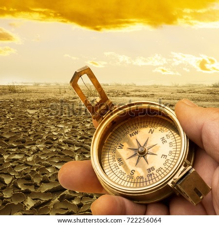 old compass in the desert