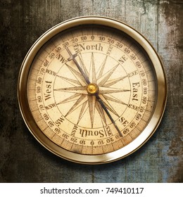 Old Compass On Vintage Background