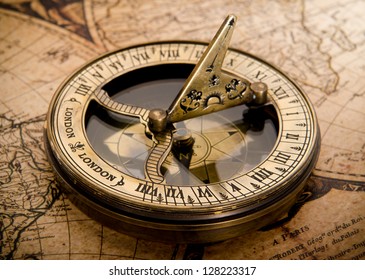 old compass on vintage map 1752