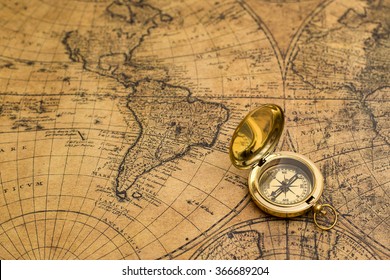 Old Compass On Vintage Map