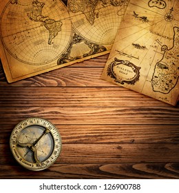 Old Compass And Vintage Maps