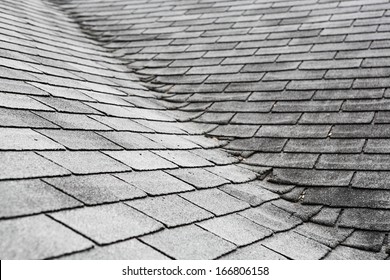 Old Composite  Roof With Damage