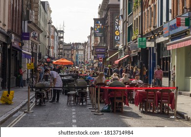 Old Compton Street In Soho With Outside Drinking And Dining During The Daytime. London - 12th September 2020