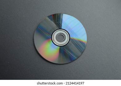 Old Computer CDs Used For Recording Information In The 1990s And Early 2000s Marked In English.