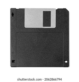 Old computer and data storage technology, black plastic magnetic floppy disk 3½ inches, isolated on white background