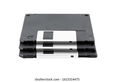 Old computer diskette over white background. Black Diskette. 