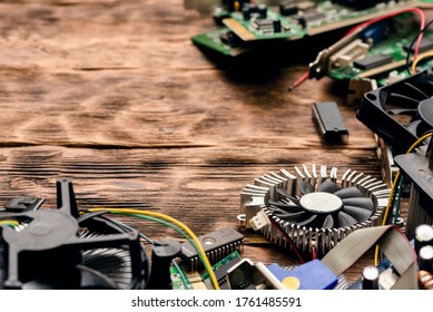 Old Computer Parts On A Wooden Table Flat Lay Background With Copy Space.