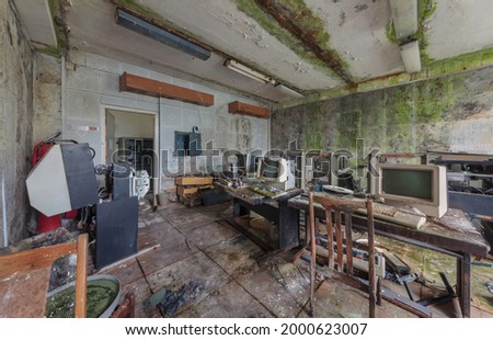 Old computers from the 80s in an abandoned computing center