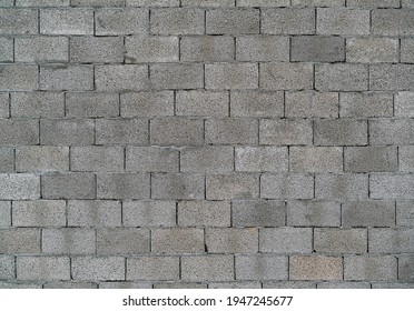 Old concrete block wall background and texture - Shutterstock ID 1947245677