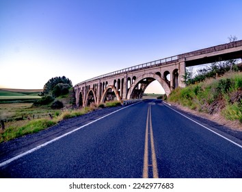 Old concrete trestle style bridge in the Palouse area of Washington - Shutterstock ID 2242977683