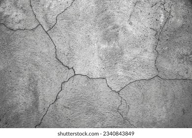 Old concrete wall background.Beautiful cracks in concrete or plaster in cracks