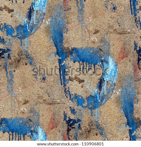 old concrete wall with streaks of blue paint seamless texture
