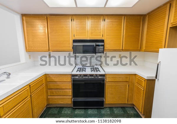 Old Condo Kitchen Oak Cabinets Tile Stock Photo Edit Now 1138182098