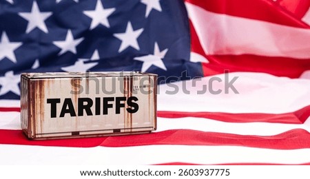 Old Container tariffs word on Flag of the United States of America background. Tariff US trade war with Canada and Mexico.