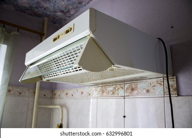 Old cooker hood in the kitchen with poor repair
