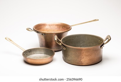 old copper pots isolated on white background