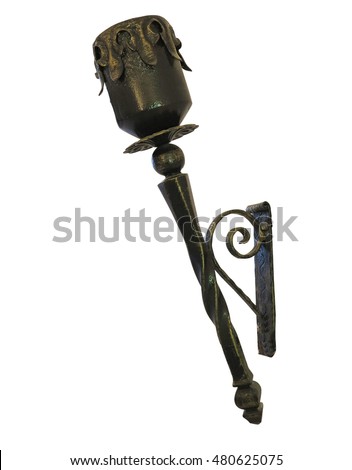 Old copper torch isolated over white background