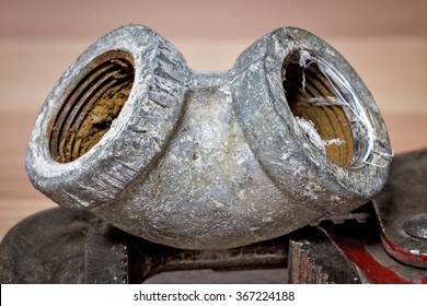 Old Corroded Pipe Elbow Close Up