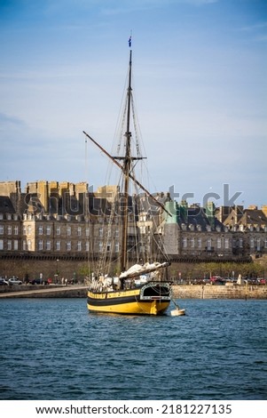 Old corsair ship in the port of Saint-Malo at sunset, Brittany, France