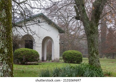 Old Cottage House From Argentina In A  Cloudy Day. Some Fog At The Garden 