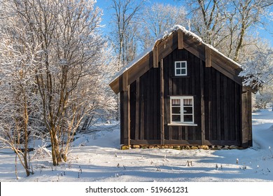 Old Cottage In Winter With Snow