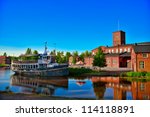 Old cotton spinning mill buildings of red brick in Forssa, Finland