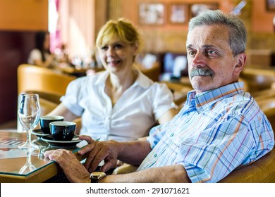 Old Couple In Cafe 