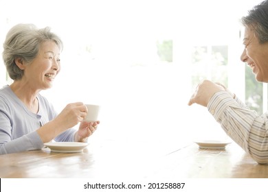 The Old Couple Drinking Coffee