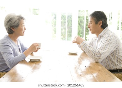 The Old Couple Drinking Coffee