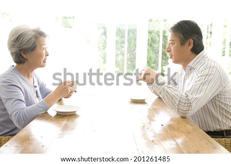 The old couple drinking coffee