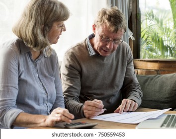 Old Couple Filling Out A Form