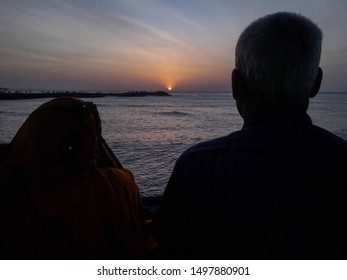 Old Couple Praying Sun The God Of Light In Hinduism Is Showing The Respect And Nature Love Of A Human Being. The Image Is Taken At Kanyakumari Tamilnadu India.