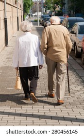 Old Couple Walking