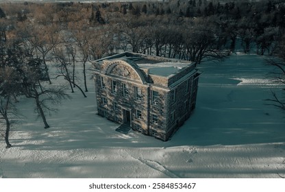 old courthouse surrounded by trees