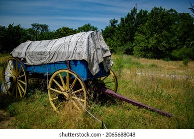 An Old Covered Wagon At A Museum