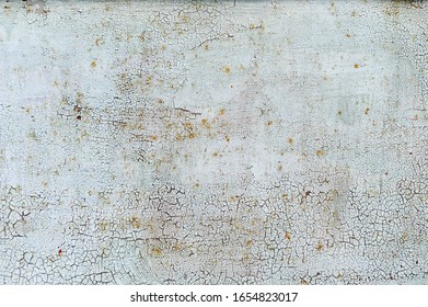 Old Cracked White Coat Of Paint Background With Leaky Rust