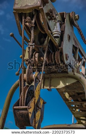Old crane mechanism on an old truck now abandon