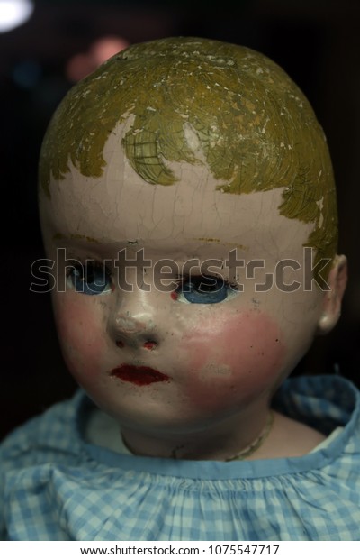 creepy doll head