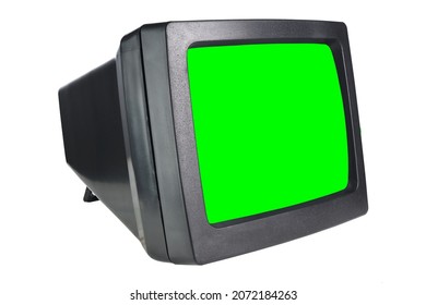 Old CRT Computer Monitor With Green Screen Isolated On White.