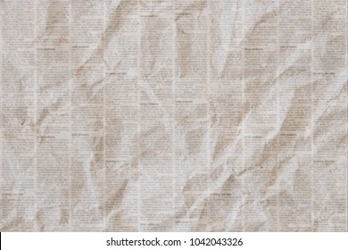 Old crumpled grunge newspaper paper texture background. Blurred vintage newspaper background. Crumpled paper textured page. Gray brown beige collage news paper background.