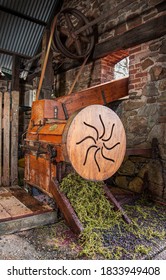 An Old Crusher/destemmer Being Used In A Traditional Barossa Valley Winery In South Australia. The Stems Are Separated From The Grapes.