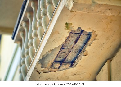Old damaged balcony. Emergency balcony, with cracked concrete. Balcony repair, cracks in reinforced concrete structure. Risk of falling plaster or concrete on pedestrians - Shutterstock ID 2167451171