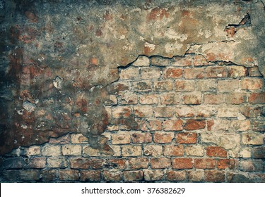 Old Damaged Brick Wall With Plaster