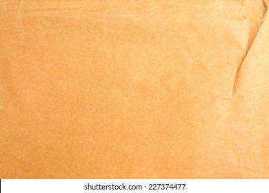 Old and damaged brown color document envelope in the scene appear cellotape from many time of using condition on isolate white background