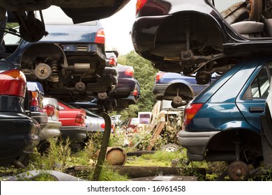 Old Damaged Cars In A Breakers Yard